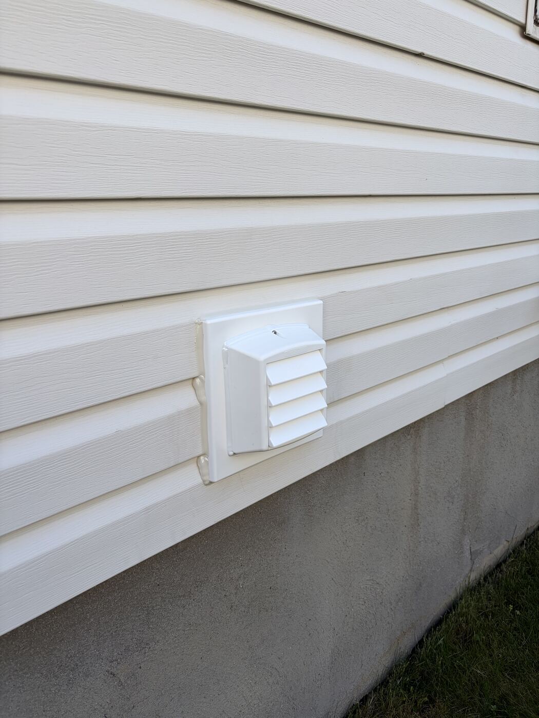 New commercial-grade intake vent installed on mounting block with sealed edges